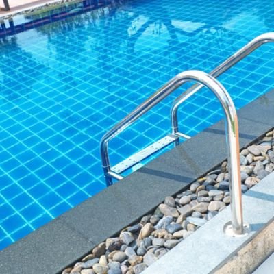 Expert swimming pool cleaning Delhi NCR deep cleaning service removing waterline stains and algae