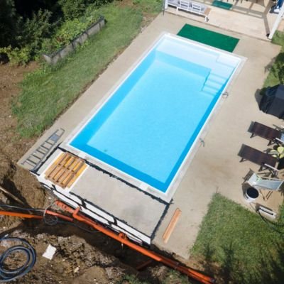 Professional swimming pool installation Delhi NCR excavation and site preparation at residential property
